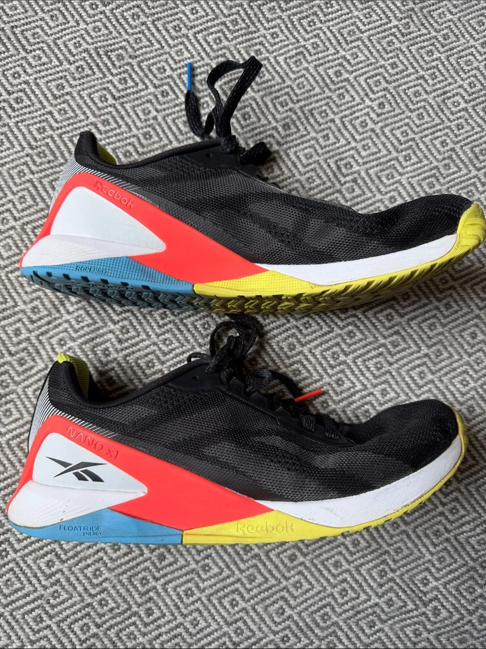 Reebok Nano X1 Black Running Shoes with Yellow, Red and Blue Accents